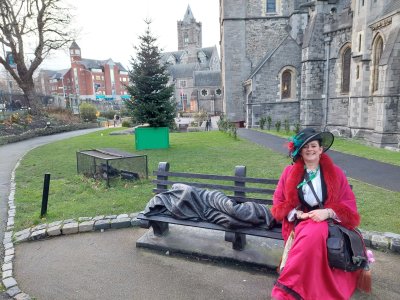 dalton's musical history tour tour guide seated outside of christ church cathedral